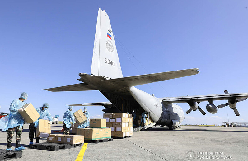 PPE & COVID-19 testing kits arrive in the Philippines from China, March 2020. <br>CREDIT: <a href=https://commons.wikimedia.org/wiki/File:China_COVID19_test_kit_PH_donation_10.jpg>Philippines Presidential Communications Operations Office/Wikimedia (CC)</a>.