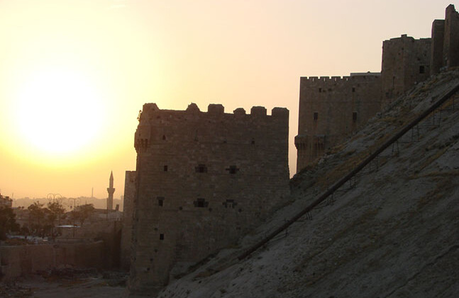 Citadel of Aleppo, 2007. Damaged by shelling, 2012. CREDIT: <a href="http://tinyurl.com/kkuwfw3">Watchsmart</a>,  (<a href="http://creativecommons.org/licenses/by/2.0/deed.en">CC</a>)