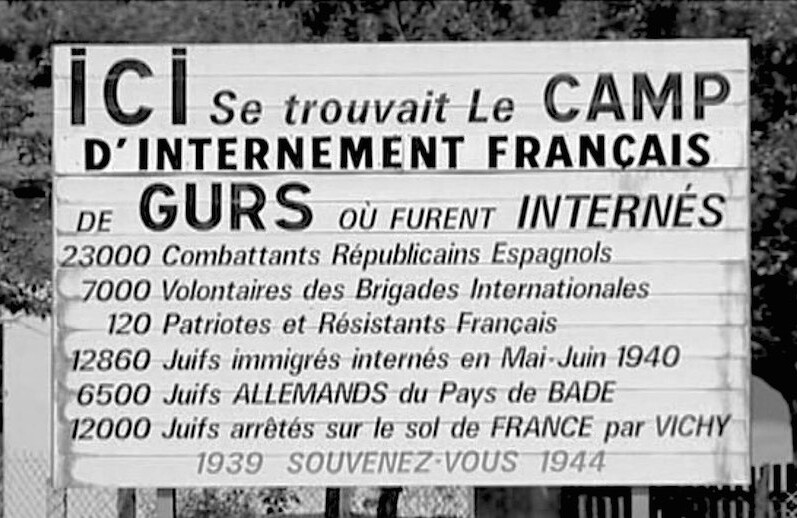 Memorial sign at the Gurs Internment Camp, Southwest France, listing the groups imprisoned there. CREDIT: <a href="https://commons.wikimedia.org/wiki/File:Camp_de_Gurs_panneau_m%C3%A9moriel_1980.jpg"> Claude Truong-Ngoc</a> ,1980. (<a href="https://creativecommons.org/licenses/by-sa/3.0/deed.en">CC</a>)