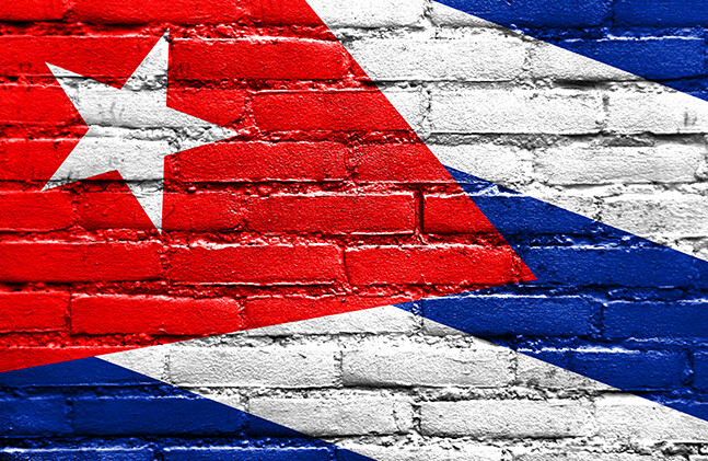 CREDIT: <a href="http://www.shutterstock.com/pic-211937704/stock-photo-cuba-flag-painted-on-brick-wall.html">Shutterstock</a>