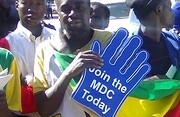 Pro-MDC expatriates in South Africa. <br>Photo by <a href="http://flickr.com/photos/sokwanele/1380821576/in/set-72157602012405157/">Sokwanele-Zimbabwe</a> (<a href="http://creativecommons.org/licenses/by-nc-sa/2.0/deed.en">CC</a>).