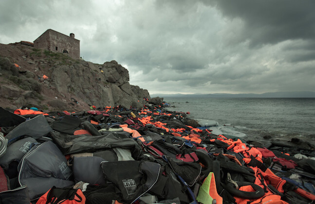 Migrants' life jackets and inflatable tubes on Lesbos. CREDIT: <a href="http://www.tysonsadler.com/">Tyson Sadler</a>. (See also Sadler's Carnegie Council <a href="http://tinyurl.com/zdqle69">Instagram Take-over</a>.)