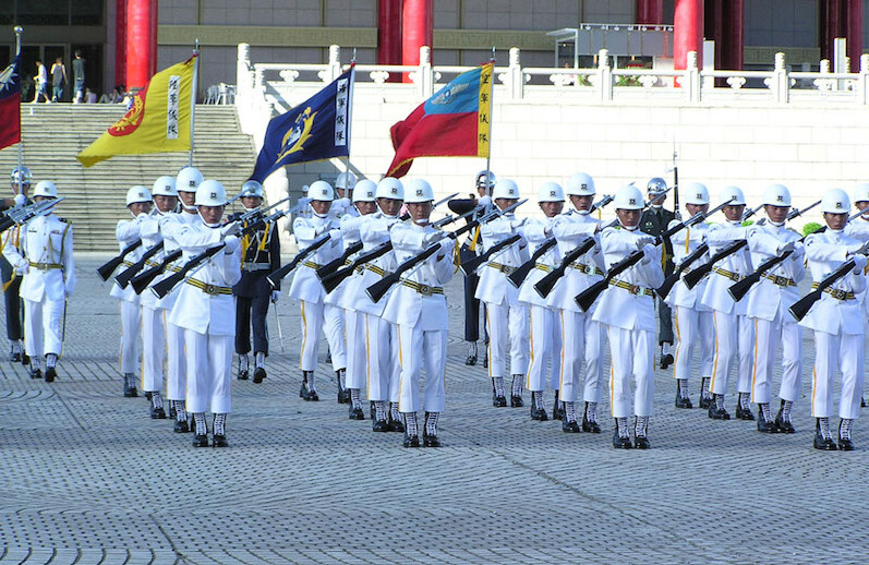 Honor Guard of Republic of China at Chiang Kai-shek Memorial Hall, Taipei City, Taiwain, 2004. <br>CREDIT: <a href="https://commons.wikimedia.org/wiki/File:Military_parade_in_front_of_Chiang_Kai-shek_Memorial_Hall.jpg">Batiste Pannetier/Free Art License</a>.