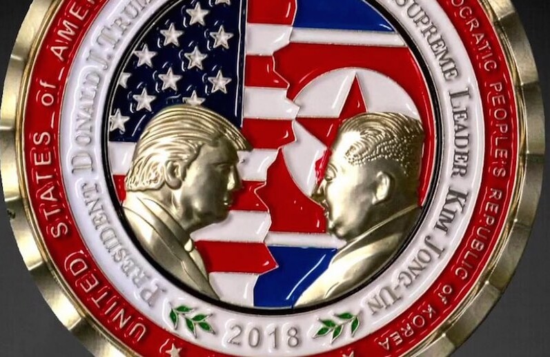 Commemorative medallion for the 2018 North Korea–United States summit issued by the White House Communications Agency. CREDIT: White House Communications Agency via <a href="https://commons.wikimedia.org/wiki/File:2018_Trump-Kim_summit_commemorative_coin.jpg">Wikipedia</a>