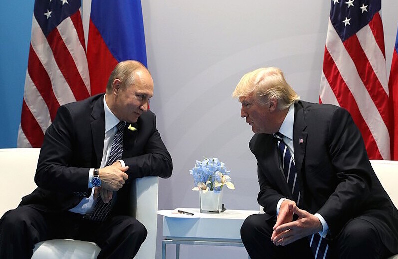 Vladimir Putin and Donald Trump at the 2017 G-20 summit in Hamburg, Germany, July 2017. CREDIT: <a href="https://commons.wikimedia.org/wiki/File:Vladimir_Putin_and_Donald_Trump_at_the_2017_G-20_Hamburg_Summit_(3).jpg">Kremlin.ru (CC)</a>