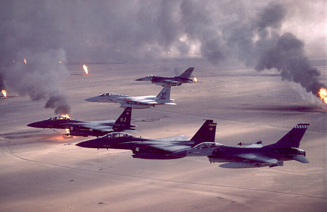 U.S. Air Force jets fly over burning oil field sites in Kuwait during Operation Desert Storm. CREDIT: <A HREF="https://www.flickr.com/photos/usairforce/6144567886/">U.S. Air Force</a>