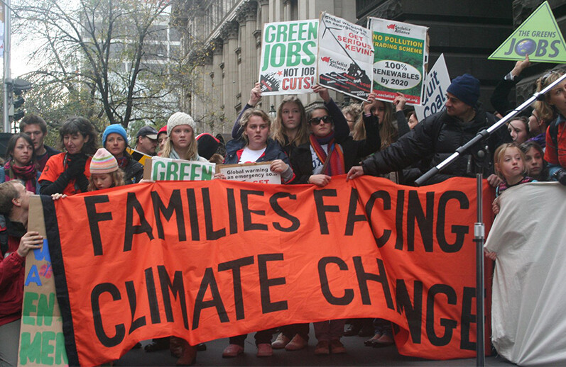 Families partake in a climate emergency protest in Melbourne, Australia. CREDIT: <A href=https://www.flickr.com/photos/takver/3622617318/>Takver (CC)</a>.