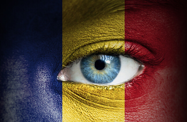 CREDIT: <a href="http://www.shutterstock.com/pic-120202348/stock-photo-human-face-painted-with-flag-of-romania.html?src=dt_last_search-3">Shutterstock</a>