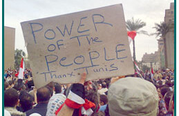 A protester in Cairo, February 2011. <br>CREDIT: <a href="http://www.flickr.com/photos/ramyraoof/5416807660/" target="_blank">RamyRaoof</a>