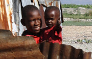 Haitian boys in a metal shanty. Photo by <br>Sean Blaschke &copy; 2009.