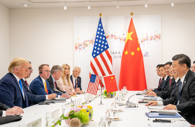 Donald Trump meets with Xi Jinping in June 2019 at the G20 Summit in Osaka, Japan. CREDIT: <a href=https://www.flickr.com/photos/whitehouse/48162295476/>Official White House Photo/Shealah Craighead (CC)</a>.