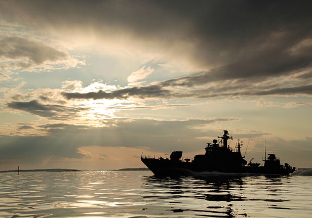 CREDIT: <a href="http://www.shutterstock.com/pic-89200546/stock-photo-warship-with-threatening-sky.html">Warship with threatening sky</a> via Shutterstock