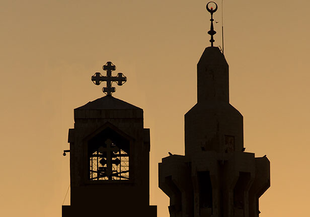 <a href="http://www.shutterstock.com/pic-34762768/stock-photo-a-minaret-of-the-king-hussein-mosque-and-the-steeple-of-the-coptic-orthodox-church-silhouetted-on.html?src=BwCDN9pOUWbl0oBPEnD7Hg-1-1">Amman Skyline Silhouette</a> via Shutterstock