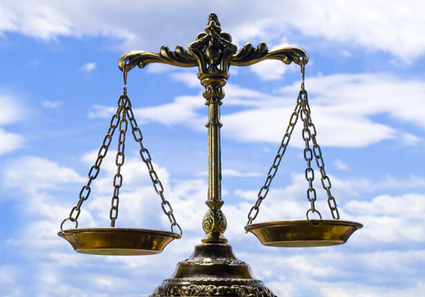 CREDIT: <a href="http://www.shutterstock.com/pic-14046070/stock-photo-a-photo-of-the-scales-of-justice-with-a-balance-theme-overlay.html" target="_blank">Shutterstock</a>