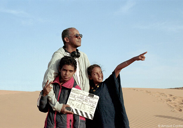Director Abderrahmane Sissako with cast. <a href="http://cohenmedia.filmtrackonline.com/extranet/pages/explorerview.aspx?projectId=9d925386-5c1e-e411-ba69-d4ae527c3b65">Cohen Media</a>