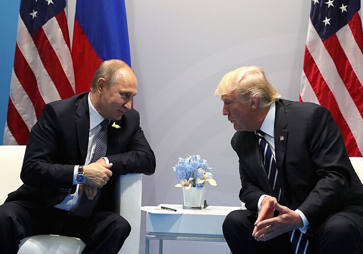 Vladimir Putin and Donald Trump at the 2017 G-20 summit in Hamburg, Germany, July 2017. CREDIT: <a href="https://commons.wikimedia.org/wiki/File:Vladimir_Putin_and_Donald_Trump_at_the_2017_G-20_Hamburg_Summit_(3).jpg">Kremlin.ru (CC)</a>