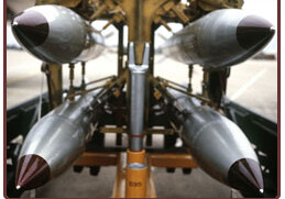 <a href="http://commons.wikimedia.org/wiki/File:B-61_bomb_rack.jpg" target=_blank">B-61 Bomb Rack</a>,  U.S. DOD (SSGT Phil Schmitten)