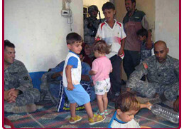 American soldiers with Iraqi children