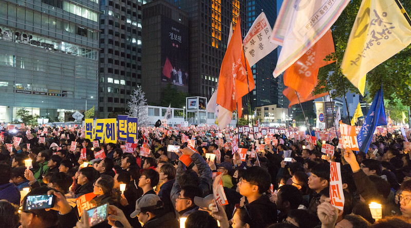 Mass protest against President Park , October 2016. CREDIT: <a href="https://www.flickr.com/photos/tkazec/30021968224/">Teddy Cross</a>. (<a href"https://creativecommons.org/licenses/by/2.0/">CC</a>)