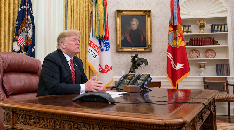 President Trump in the Oval Office on Christmas Day, 2018. CREDIT: <a href="https://www.flickr.com/photos/whitehouse/32629901988">Official White House Photo by Shealah Craighead/Public Domain</a>