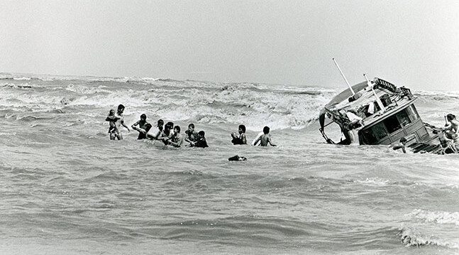 Small boat with 162 Vietnamese refugees sinks just a few meters off the Malaysian coast. Most of the refugees were rescued. <br>CREDIT: <a href="http://tinyurl.com/hfpz2ae">UNHCR/ K.Gaugler</a> December 1978