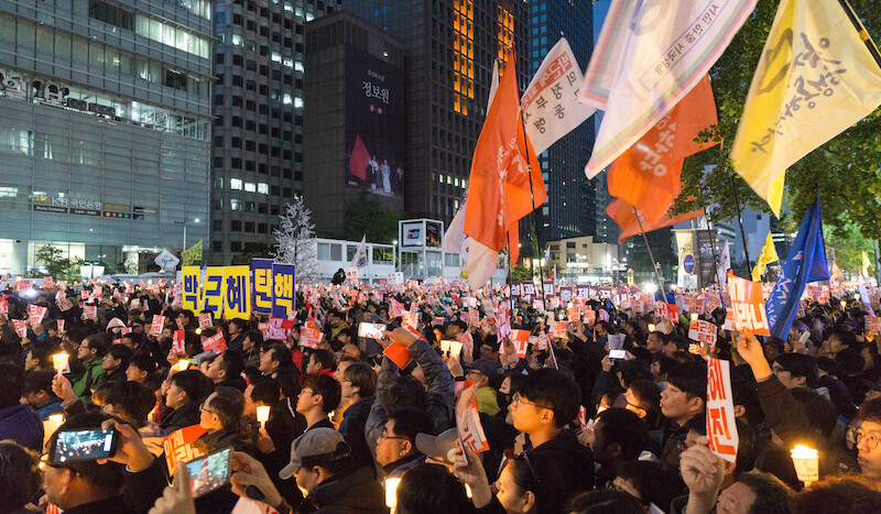 Mass protest against President Park , October 2016. CREDIT: <a href="https://www.flickr.com/photos/tkazec/30021968224/">Teddy Cross</a>. (<a href"https://creativecommons.org/licenses/by/2.0/">CC</a>)