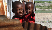 Haitian boys in a metal shanty. Photo by <br>Sean Blaschke &copy; 2009.