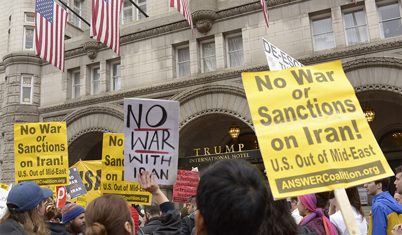 Protesters at Trump International Hotel in Washington, DC after the drone strike that killed Soleimani. CREDIT: <a href=https://www.flickr.com/photos/stephenmelkisethian/49329666788/>Stephen Melkisethian (CC)</a>.