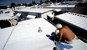 White roof paint. Credit: <a href="http://www.flickr.com/photos/nhbdy/153067064/">Chris Dick</a> (<a href="http://creativecommons.org/licenses/by-sa/2.0/deed.en">CC</a>).