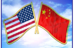 USA and China flag icons against background of sky