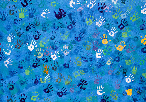 collage of colorful hand prints