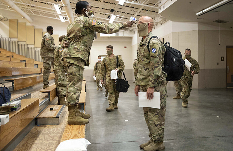 Soldiers returning from Europe. Hunter Army Airfield, Georgia, June 28, 2020, CREDIT: <a href=https://www.defense.gov/observe/photo-gallery/igphoto/2002338683/>U.S. Department of Defense</a>.