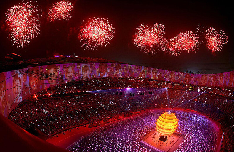 The Opening Ceremony of the 2008 Olympics in Beijing. CREDIT: <a href="https://commons.wikimedia.org/wiki/File:The_nest_of_fireworks_-_panoramio.jpg">wuqiang_beijing (CC)</a>
