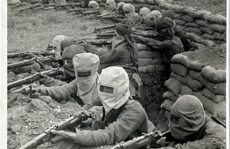 Indian infantry (58th Rifles) in Fauquissart, France, August 1915. CREDIT: <a href="https://commons.wikimedia.org/wiki/File:Indian_infantry_in_the_trenches,_prepared_against_a_gas_attack_(Photo_24-300).jpg">H. D. Girdwood/British Library/Public Domain</a>