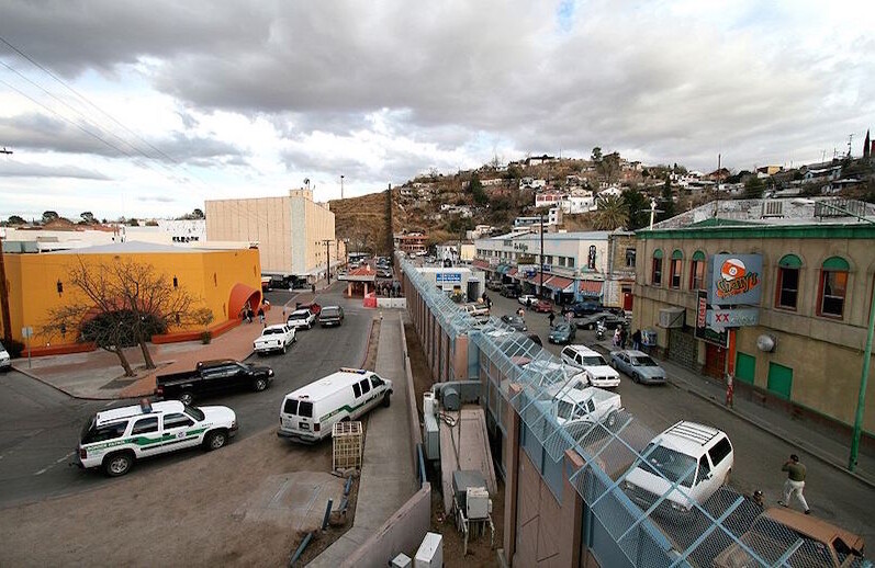 U.S.-Mexican border between Nogales, Arizona & Nogales, Sonora. CREDIT: <a href="https://commons.wikimedia.org/wiki/File:Mexican-American_border_at_Nogales.jpg">Sgt. 1st Class Gordon Hyde (CC/Public Domain)</a>