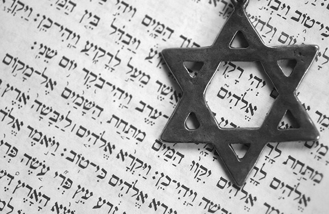 Star of David and Genesis. CREDIT: <a href="http://www.shutterstock.com/pic-815042/stock-photo-star-of-david-genesis-st-page-old-testament-hebrew-inside-the-star-god-macro-shallow-dof.html?src=zq6scaAipNtHpkPyxW1o8A-3-0">Shutterstock</a>