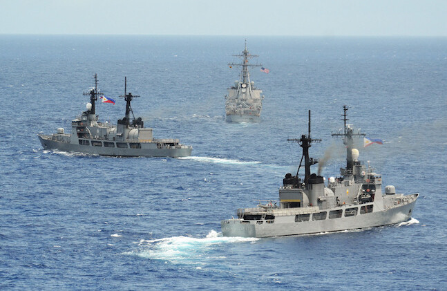 USS "John S. McCain" and Philippine navy frigates BRP "Gregaorio del Pilar" & "Ramon Alcaraz" (Top to Bottom), South China Sea, 2014. <br>CREDIT: <a href="http://bit.ly/2cKolI3">U.S. Pacific Fleet</a> <a href="http://bit.ly/1jNlqZo">(CC)</a>