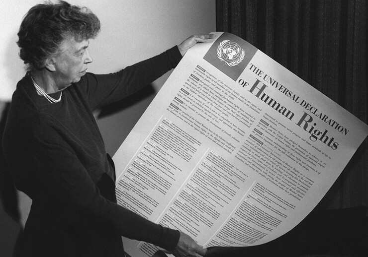 Eleanor Roosevelt holding a poster of the Universal Declaration of Human Rights, Lake Success, NY, November, 1949. <br>CREDIT: <a href="https://en.wikipedia.org/wiki/Universal_Declaration_of_Human_Rights#/media/File:Eleanor_Roosevelt_UDHR.jpg">Wikimedia</a> <a href="https://creativecommons.org/licenses/by/2.0/deed.en">(CC)</a>