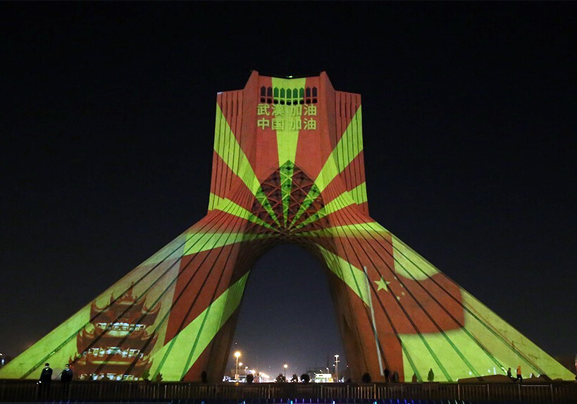 Tehran's Azadi Tower lights in support of China against coronavirus, February 2020. CREDIT: <a href="https://commons.wikimedia.org/wiki/File:Azadi_Tower_lights_in_support_of_China_against_coronavirus_2.jpg">Amin Yari (CC)</a>