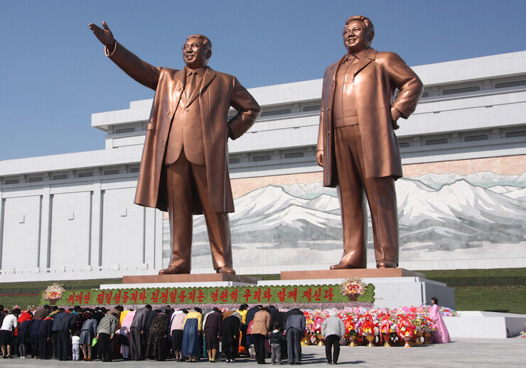 Statues of Kim Il-sung and Kim Jong-il at the Mansu Hill Grand Monument, Pyongyang. CREDIT: <a href="https://commons.wikimedia.org/wiki/File:The_statues_of_Kim_Il_Sung_and_Kim_Jong_Il_on_Mansu_Hill_in_Pyongyang_(april_2012).jpg">J.A. de Roo (CC)</a>