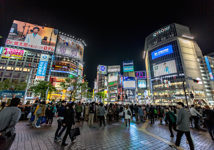 Shibuya District, Tokyo. CREDIT: <a href="https://en.wikipedia.org/wiki/Shibuya#/media/File:Shibuya_District_at_Night_2015-04_(17806976882).jpg">IQRemix (CC)</a>