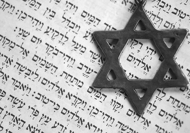 Star of David and Genesis. CREDIT: <a href="http://www.shutterstock.com/pic-815042/stock-photo-star-of-david-genesis-st-page-old-testament-hebrew-inside-the-star-god-macro-shallow-dof.html?src=zq6scaAipNtHpkPyxW1o8A-3-0">Shutterstock</a>