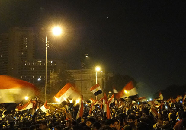 Flag of Egypt all over Tahrir Square by <a href="http://www.flickr.com/photos/ramyraoof/5436339799/" target=_blank">Ramy Raoof </a>