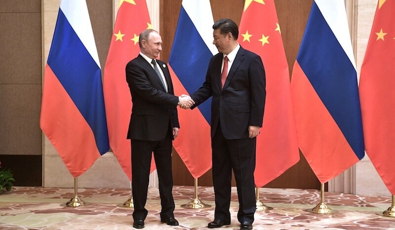 Vladmiri Putin & Xi Jinping in Beijing, May 2017. CREDIT: <a href="https://commons.wikimedia.org/wiki/File:President_Vladimir_Putin_with_President_of_China_Xi_Jinping.jpg">The Russian Presidential Press and Information Office (CC)</a>