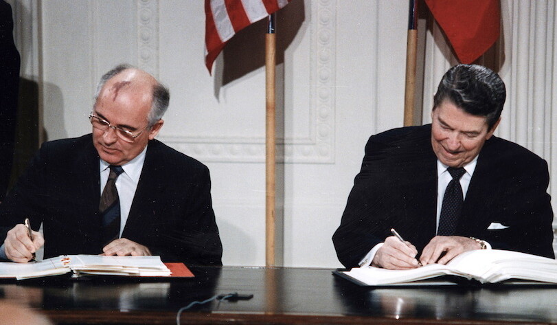 Reagan and Gorbachev signing the INF Treaty at the White House, December, 1987. CREDIT: <a href="https://commons.wikimedia.org/wiki/File:Reagan_and_Gorbachev_signing.jpg">White House Photographic Office/Public Domain</a>