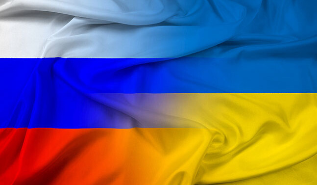 <a href="http://www.shutterstock.com/pic.mhtml?id=181796219">Russian and Ukrainian flags  </a> via Shutterstock