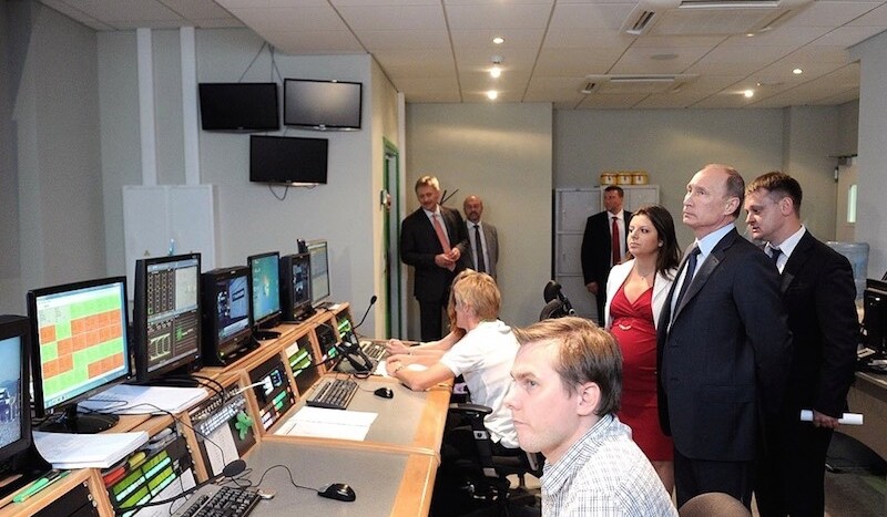 Vladimir Putin visits the new Russia Today (RT) broadcasting center, 2012. CREDIT: <a href="https://en.wikipedia.org/wiki/RT_(TV_network)#/media/File:Vladimir_Putin_-_Visit_to_Russia_Today_television_channel_2.jpg">Kremlin.ru</a> (<a href="https://creativecommons.org/licenses/by/3.0/">CC</a>)